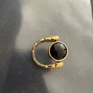 Elegant Gold and Black Ring